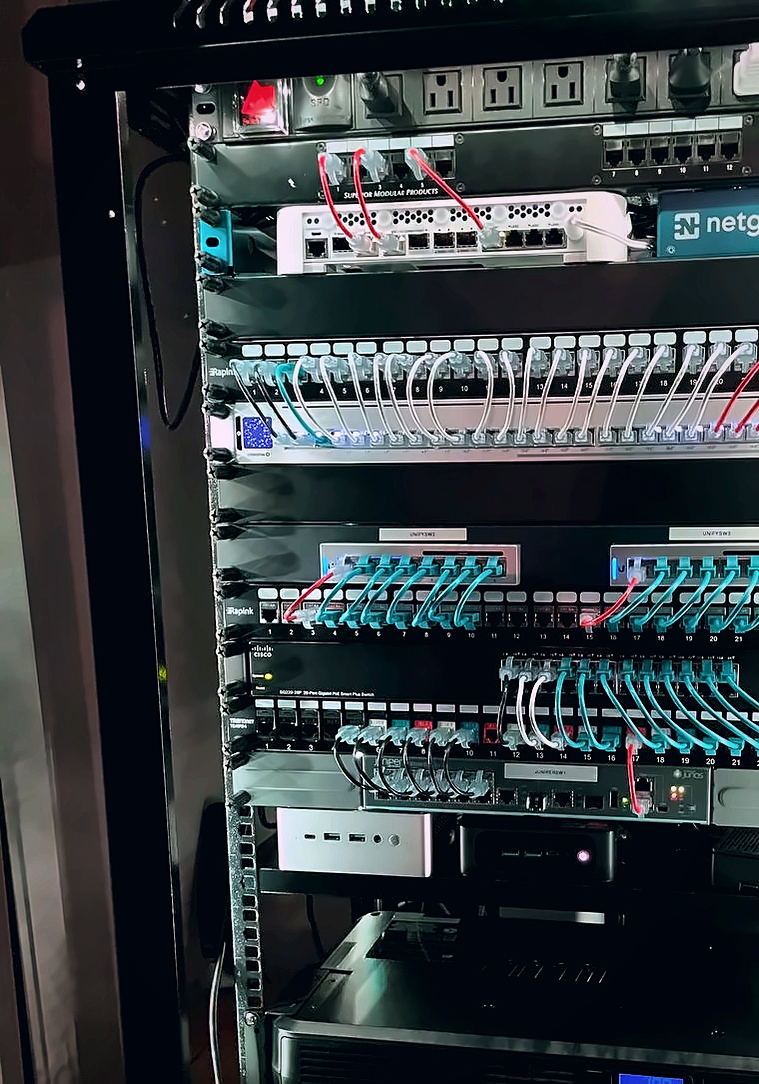 Color-coded patching by purpose, labeled switches.